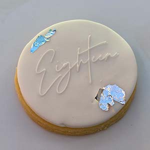 White with blue trim 18th Birthday cookies