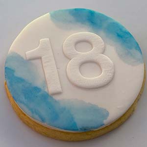 White and blue 18th Birthday cookies