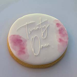 Pink and white 21st birthday cookies