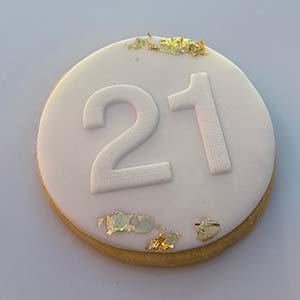 Pink with gold trim 21st cookies